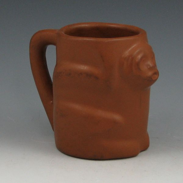 Appraisal: Van Briggle mug with monkey in semi-matte brown Marked Van