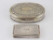 Appraisal: A Georgian silver snuff box with reeded sides and engine