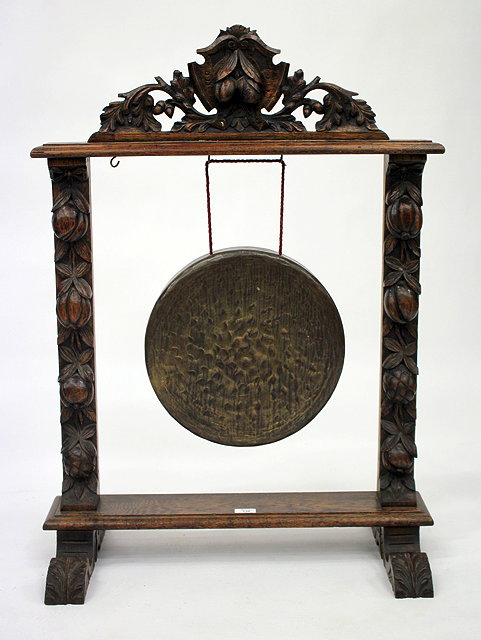 Appraisal: AN EARLY TH CENTURY OAK FRAMED GONG with carved decoration