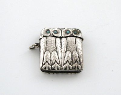 Appraisal: A continental novelty owl vesta case rectangular form modelled as