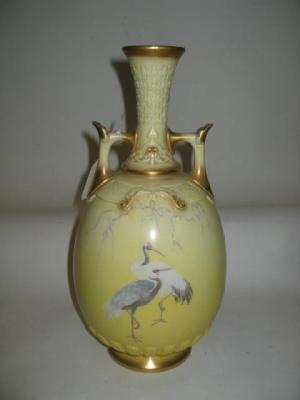 Appraisal: A ROYAL WORCESTER SHOT ENAMEL VASE of ovoid form with