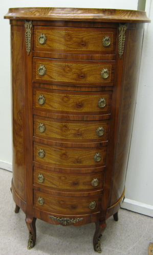 Appraisal: LOUIS XV STYLE SEMAINIER The seven-drawer lingerie chest is demilune