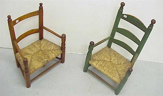 Appraisal: Two child's c ladder back armchairs the first with two