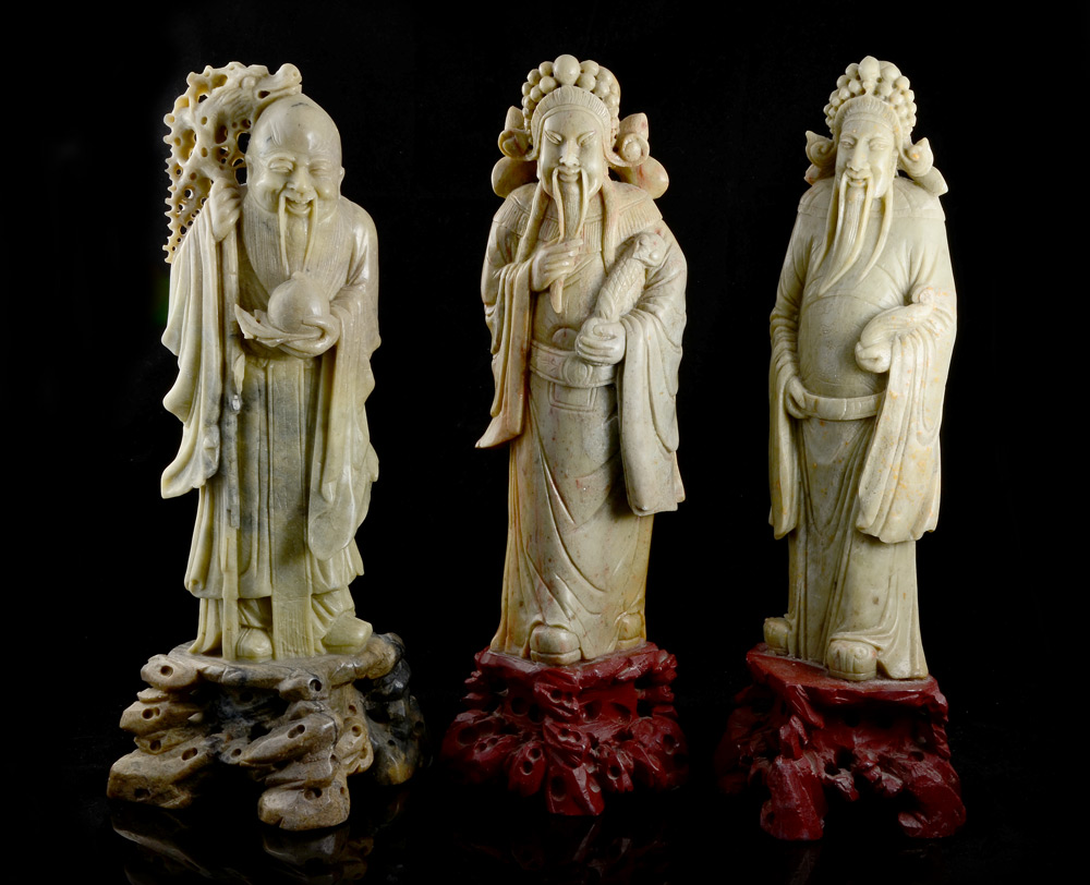 Appraisal: ORIENTAL ELDER SOAPSTONE CARVINGS figural elders tallest measures '' h