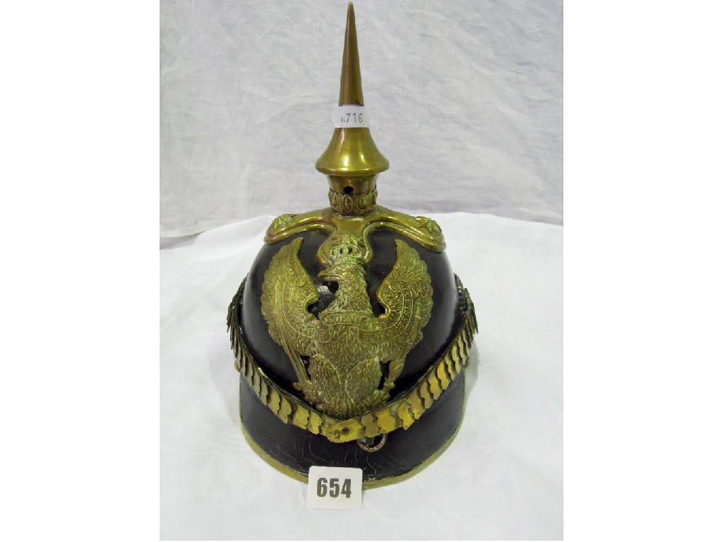 Appraisal: An Imperial Prussian dragoon guards Pickelhaube black leather bearing the