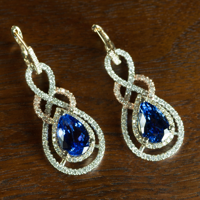 Appraisal: PAIR OF TANZANITE AND DIAMOND EARRINGS with AGI appraisal Each