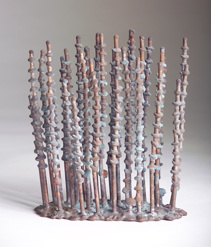 Appraisal: KLAUS IHLENFELD Welded bronze sculpture Poplars with vertical trees covered