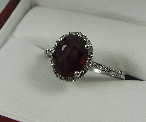 Appraisal: RUBY DIAMOND AND K WHITE GOLD RING with appraisal Centering