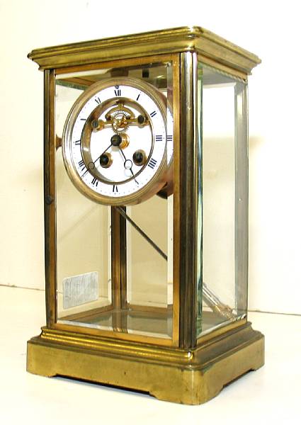 Appraisal: A French brass and four glass mantel clock early th