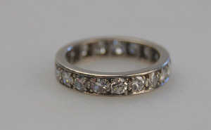 Appraisal: Diamond eternity ring set white gold millgrain set