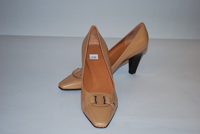 Appraisal: Salvatore Ferragamo tan calf pumps with signature tab Size B