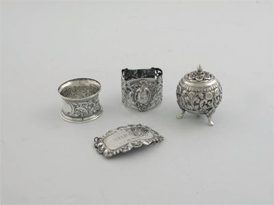 Appraisal: Five floral embossed napkin rings Birmingham a pair fret Sheffield