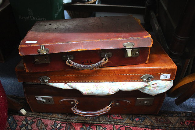 Appraisal: AND OLD LEATHER SUITCASE cm wide together with two other