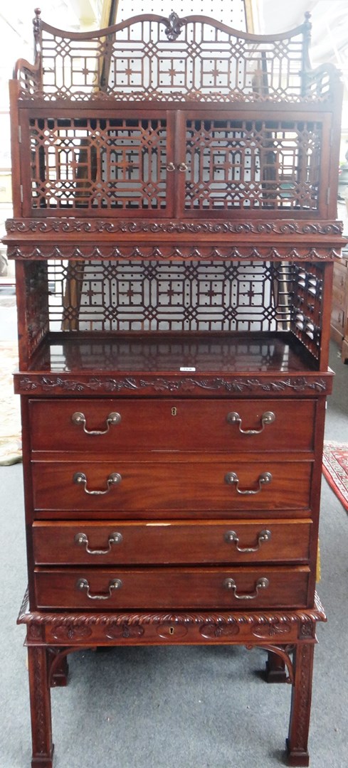 Appraisal: A Chinese Chippendale style side cabinet the three tier open