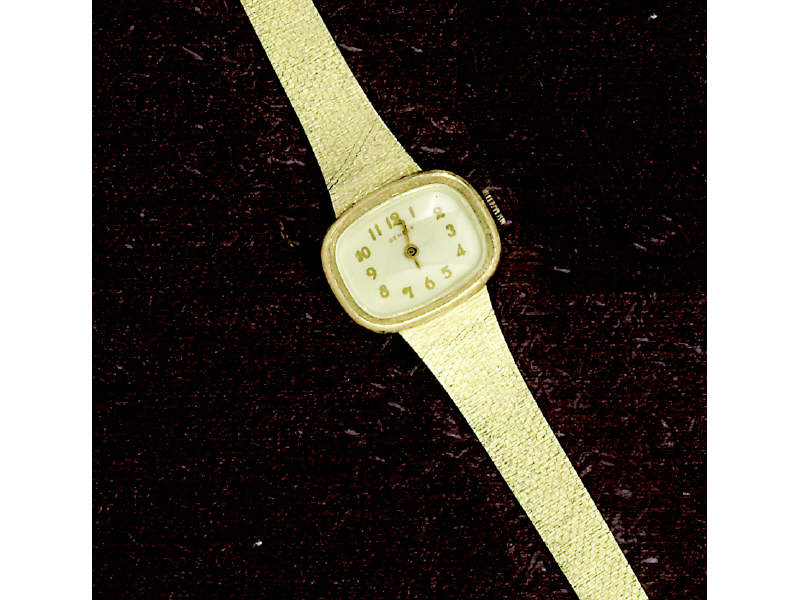 Appraisal: LADY'S GOLD WATCH k yellow gold Geneve manual wind watch