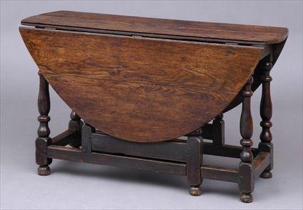 Appraisal: ENGLISH OAK GATE LEG TABLE The top with bowed ends