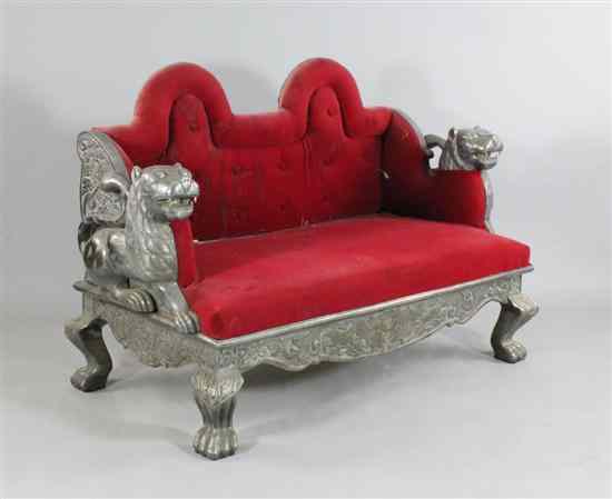 Appraisal: An Indian silver overlaid bench with lion end supports on