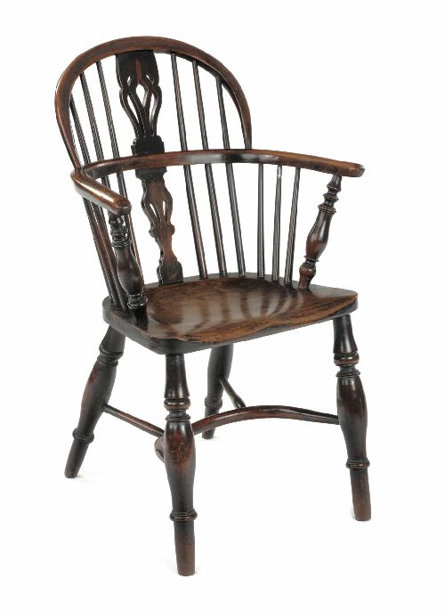 Appraisal: An early th century yew and elm Windsor armchair North