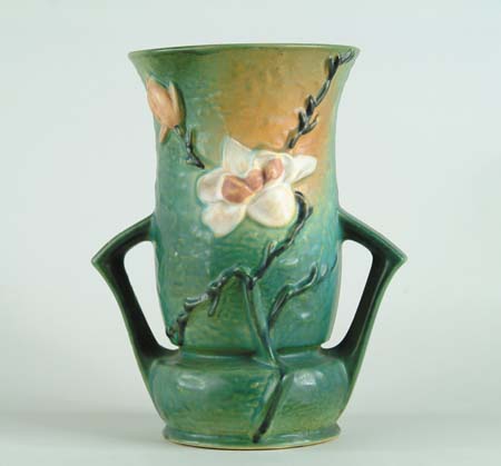 Appraisal: ROSEVILLE MAGNOLIA HANDLED VASE Shape No Roseville mark in relief