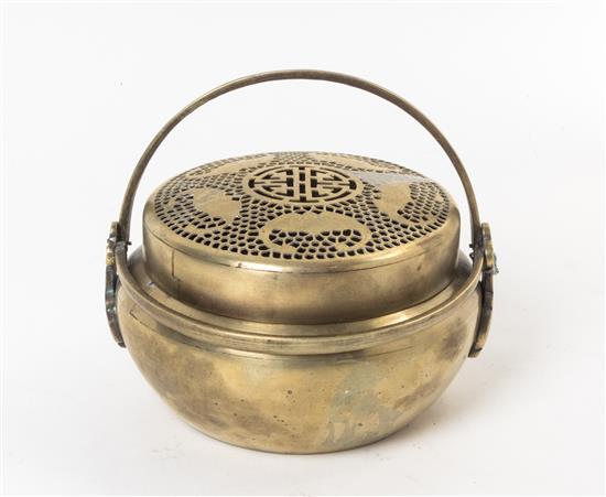 Appraisal: Sale Lot A Copper Hand Warmer the cover with openwork