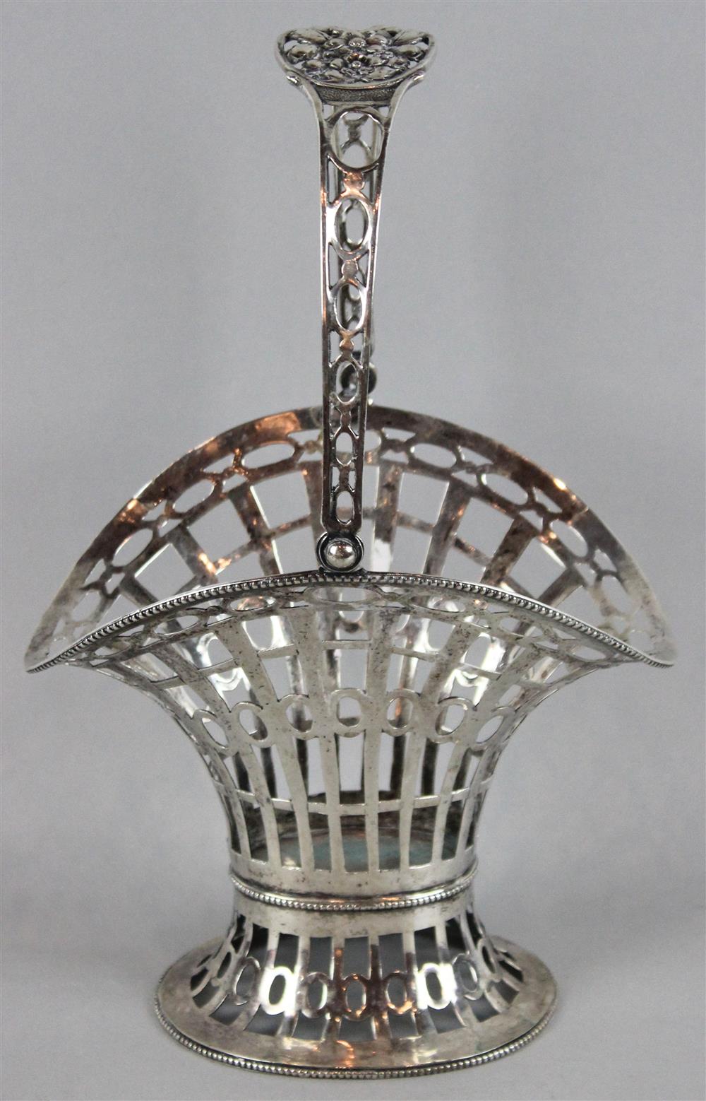 Appraisal: CONTINENTAL SILVER CAKE BASKET late th C with pierced swing