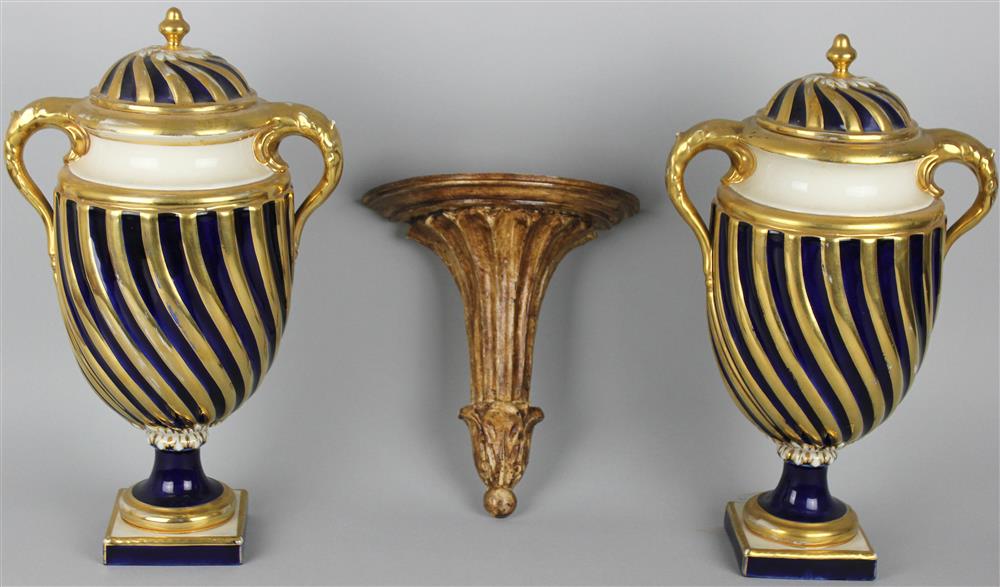 Appraisal: PAIR OF ROYAL DUX BOHEMIA COBALT AND GILT URNS AND