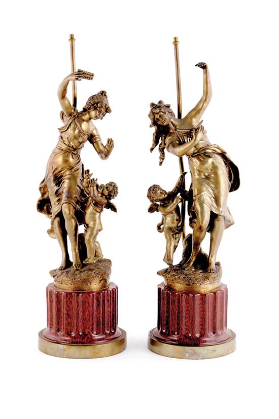 Appraisal: Pair bronze figural lamps nymph and putto on fluted pedestal