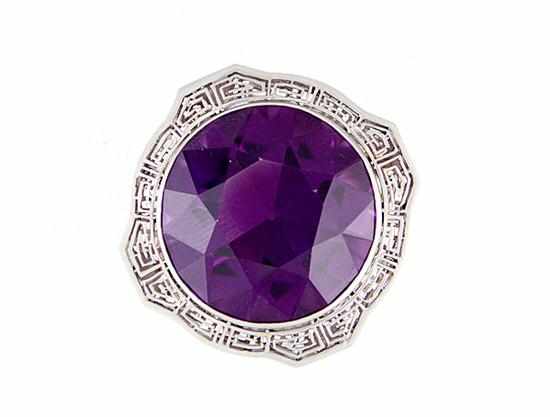 Appraisal: Antique amethyst and platinum brooch th century mm purple round