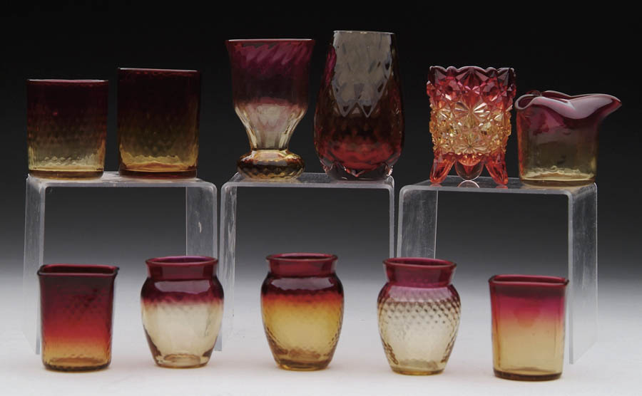 Appraisal: ELEVEN AMBERINA MINI VASES Lot consists of eleven Amberina mini