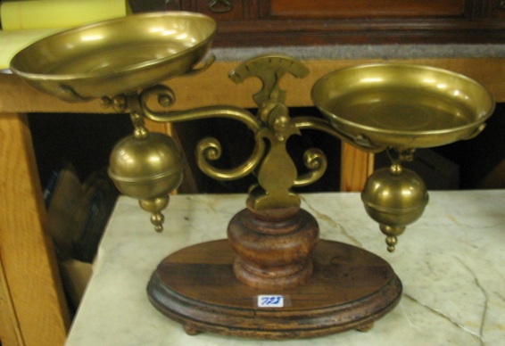 Appraisal: AN ENGLISH BRASS BALANCE SCALE with brass enclosed counterweights brass