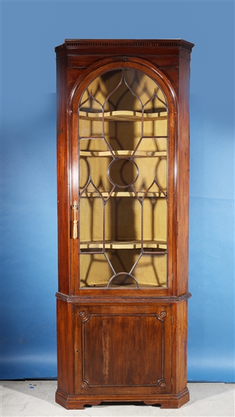 Appraisal: Antique wooden barrel-form glass display side cabinet with metal fittings