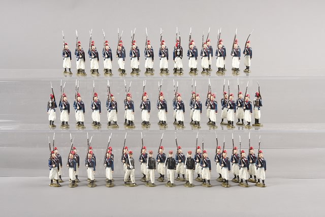 Appraisal: A similar lot of French Turcos figures with officers marching