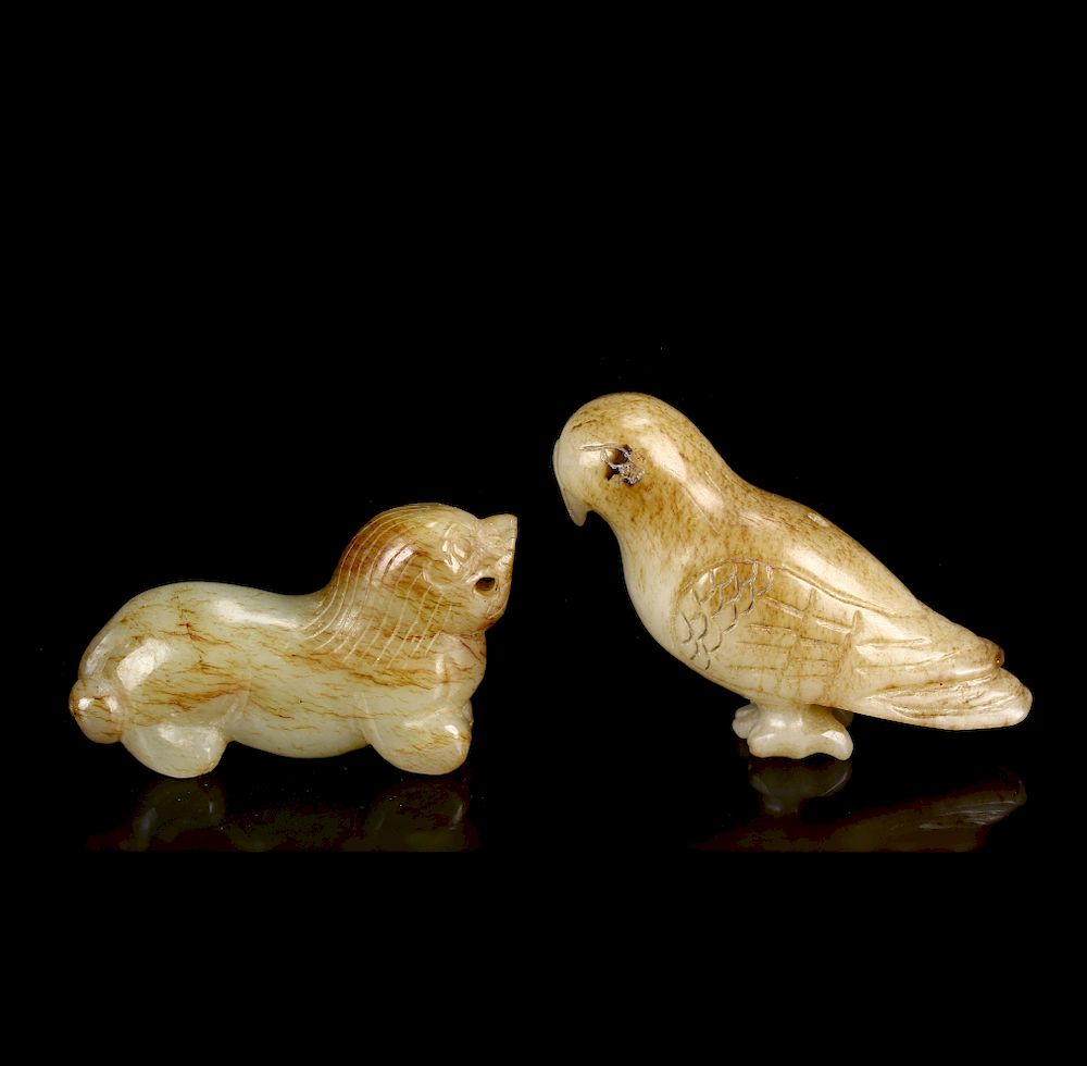 Appraisal: Two Celadon and Russet Jade Animals One is shape of