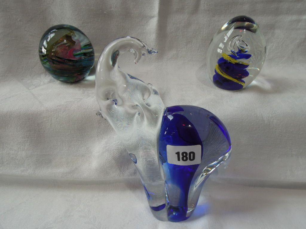 Appraisal: A Murano glass elephant together with two glass paperweights with