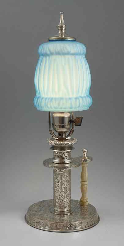 Appraisal: SILVEPLATED CHAMBER STICK TYPE LAMP WITH IVORY HANDLE Early s