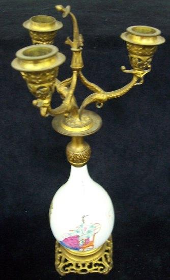 Appraisal: A three-branch gilt metal candelabra set into a pear shape