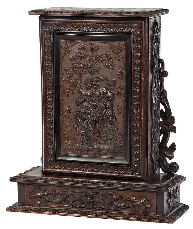 Appraisal: Black Forest Carved Wood Wall Cabinet Continental th century rectangular