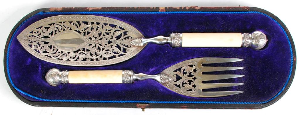 Appraisal: FINE PAIR OF VICTORIAN EP FISH SERVERS with foliate scroll