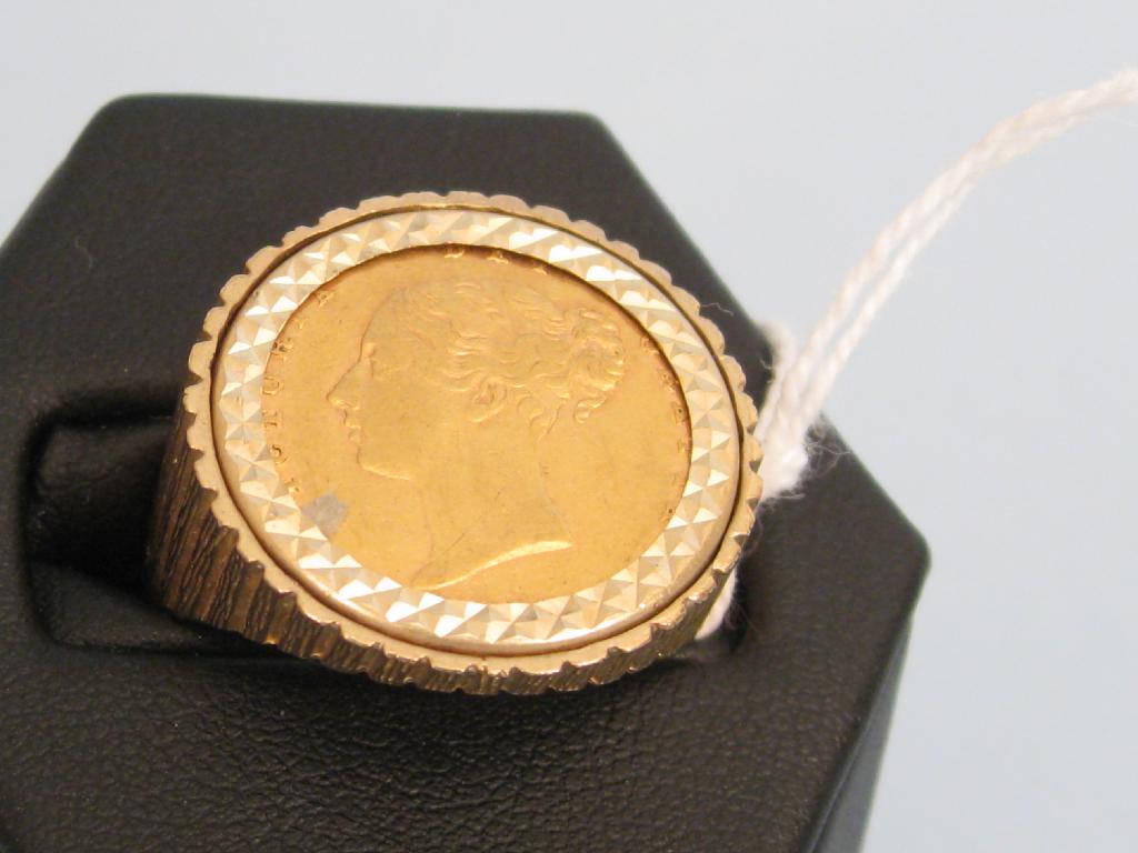 Appraisal: A Victorian young head Half Sovereign Ring in ct gold