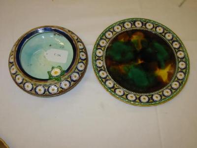 Appraisal: A WEDGWOOD MAJOLICA DISH AND STAND moulded with a border