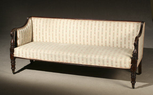 Appraisal: Regency Mahogany Sofa Circa Having an ivory ground pastel striped