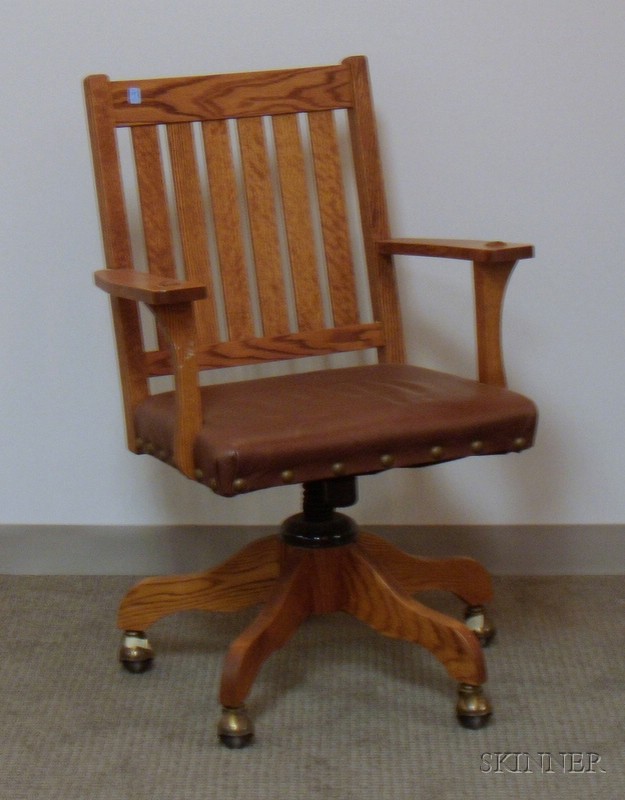 Appraisal: Arts Crafts Style Oak Swivel Desk Armchair