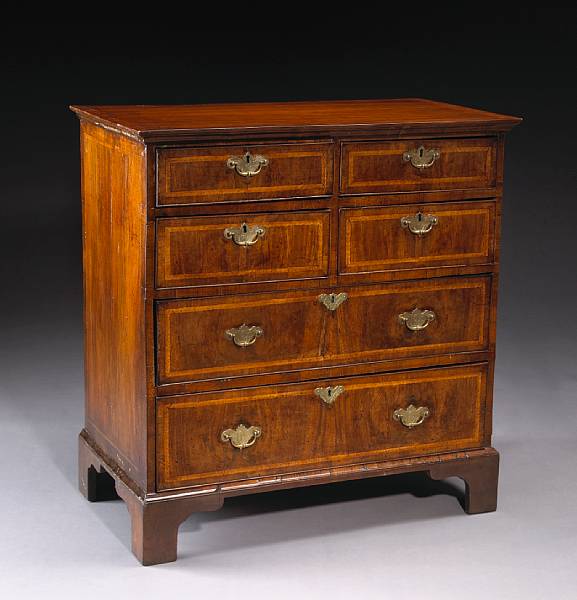 Appraisal: A George II inlaid walnut chest of drawers second quarter