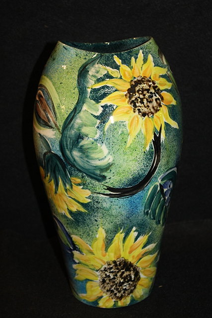 Appraisal: A PAUL JACKSON STUDIO POTTERY VASE decorated with sunflowers signed