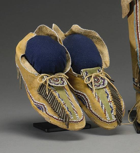 Appraisal: Property from a Southwest collector Partially beaded on the toe