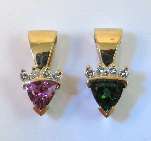 Appraisal: TWO TOURMALINE AND DIAMOND PENDANTS one set with a trillion-cut