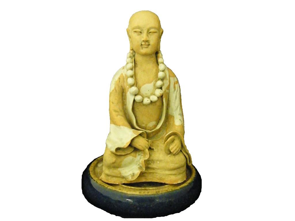 Appraisal: th century Oriental terracotta seated Buddha figure high also an