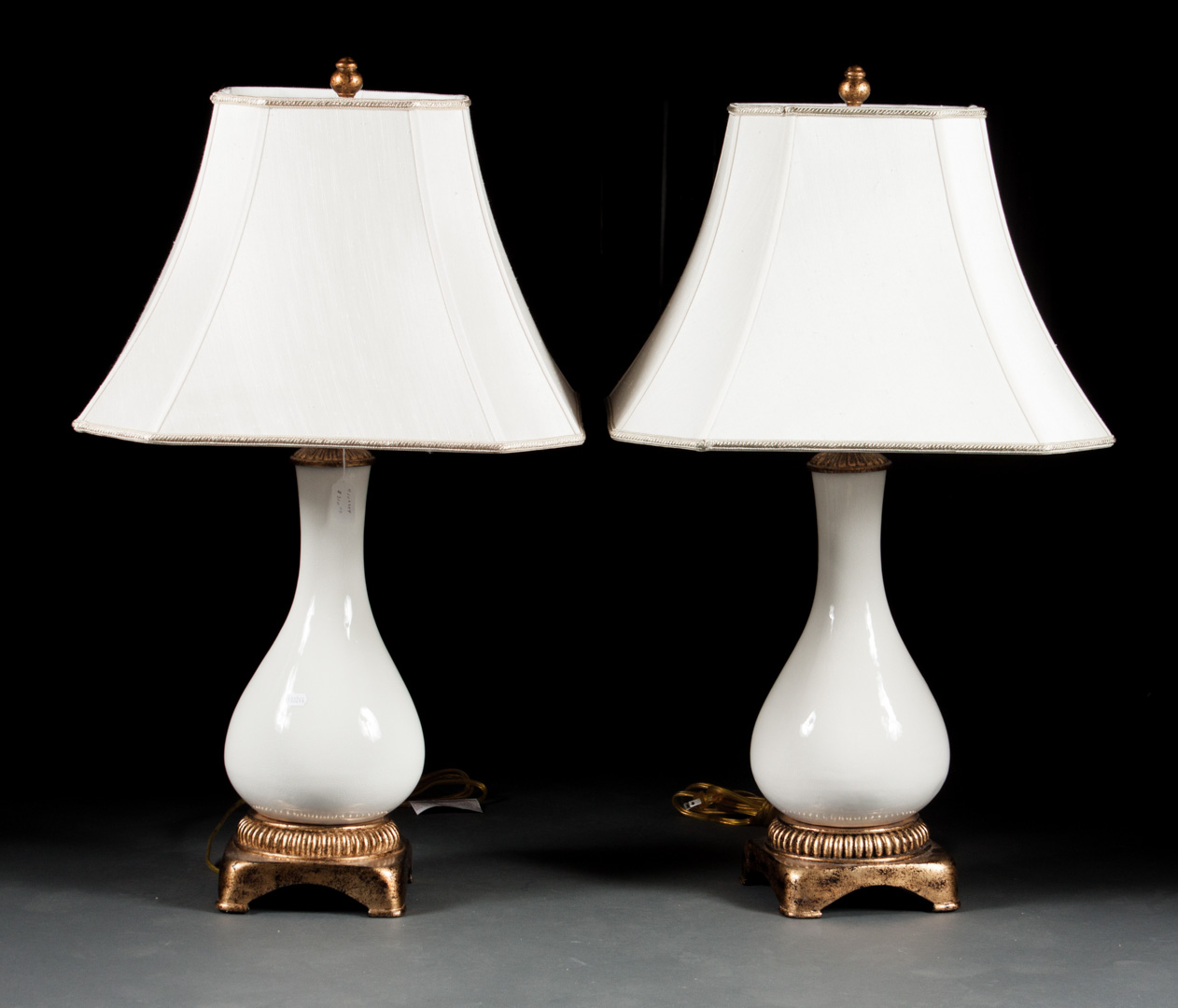 Appraisal: Pair of crackle glazed porcelain bottle vase lamps with giltwood