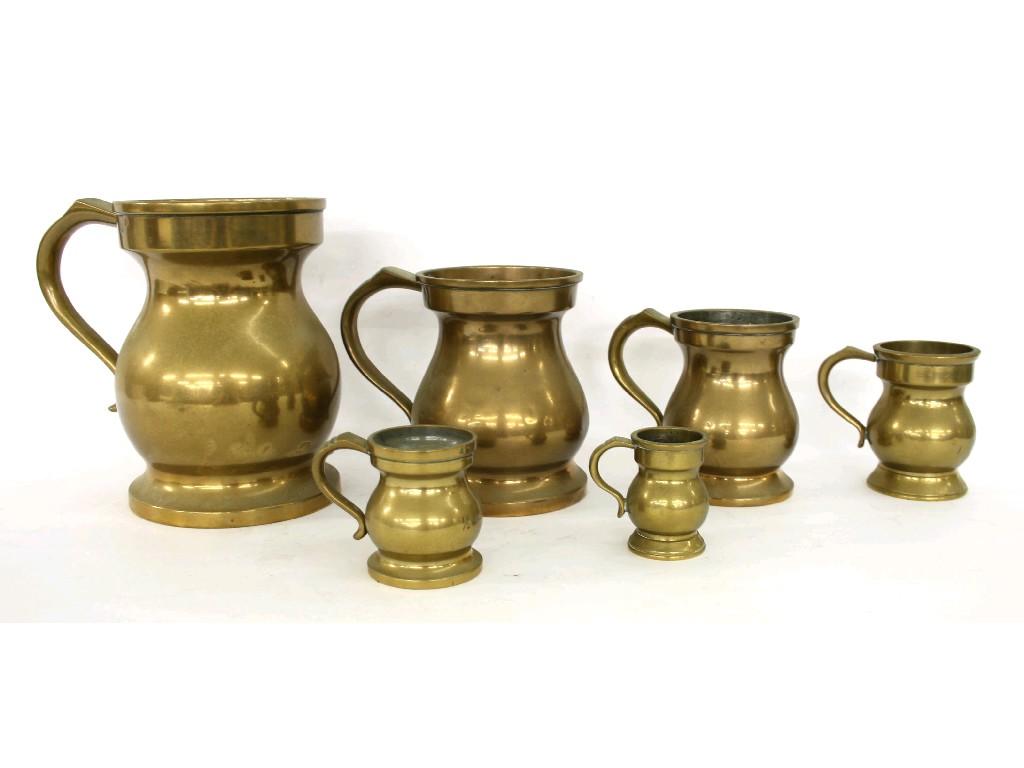 Appraisal: Graduated set of six gun metal and brass baluster tankards