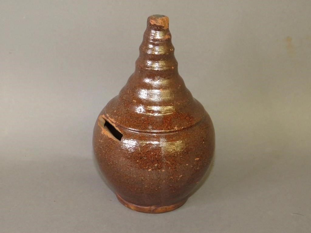 Appraisal: PA REDWARE BANKca late th century PA redware bulbous bank